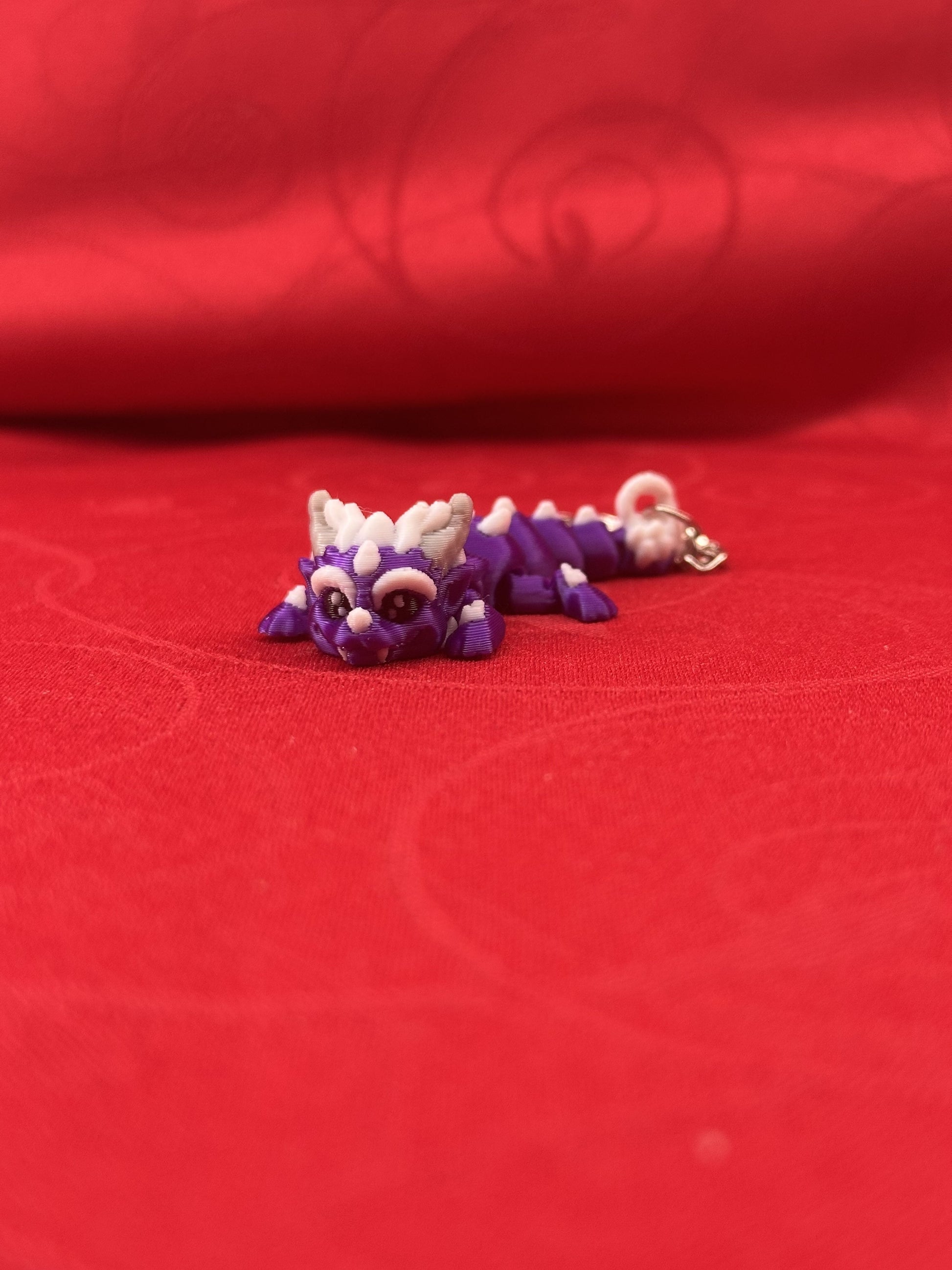 Porte-clés dragons articulés diecastartisanat