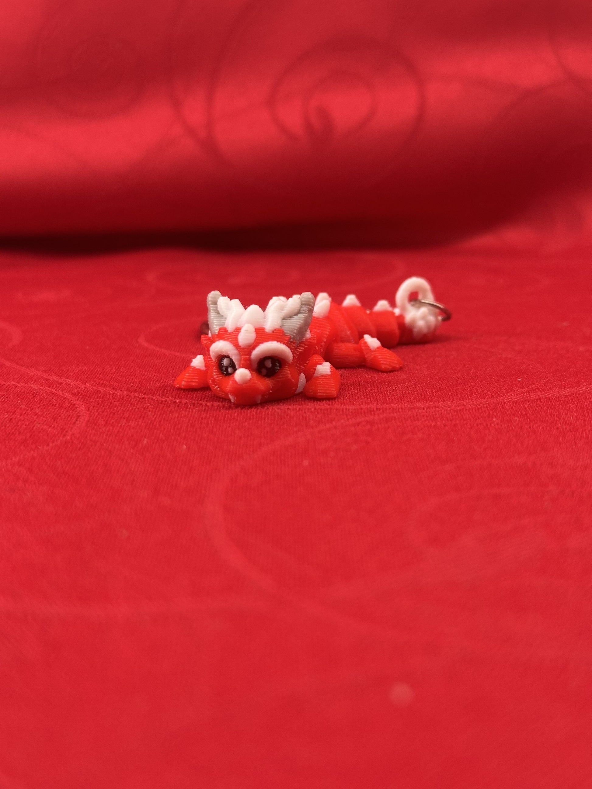 Porte-clés dragons articulés diecastartisanat