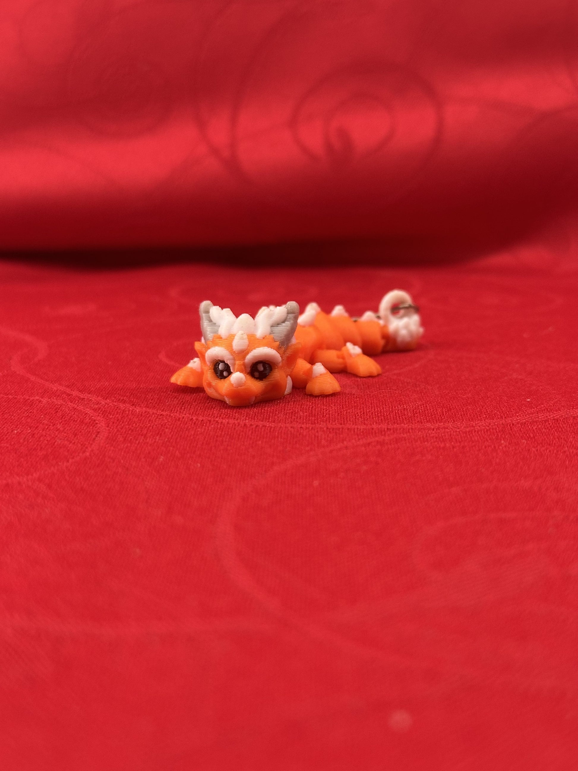 Porte-clés dragons articulés diecastartisanat