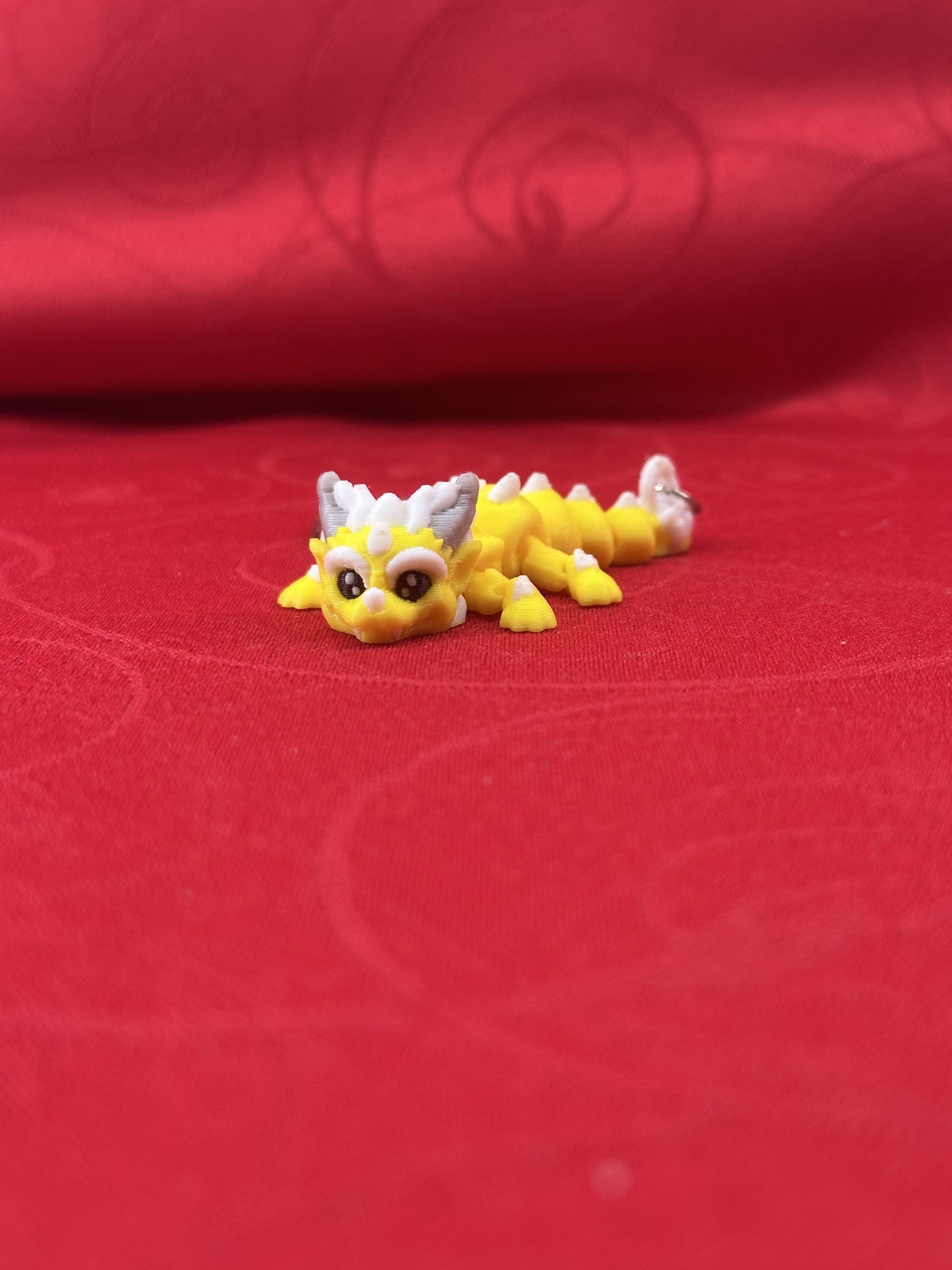 Porte-clés dragons articulés diecastartisanat