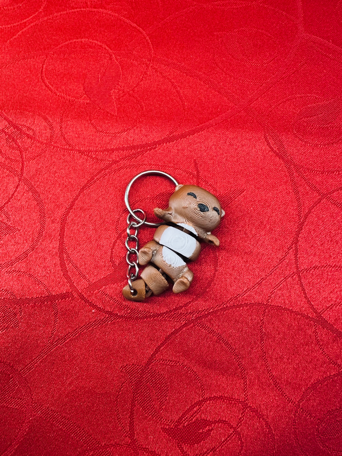 Porte-clé Loutre Mignon diecastartisanat